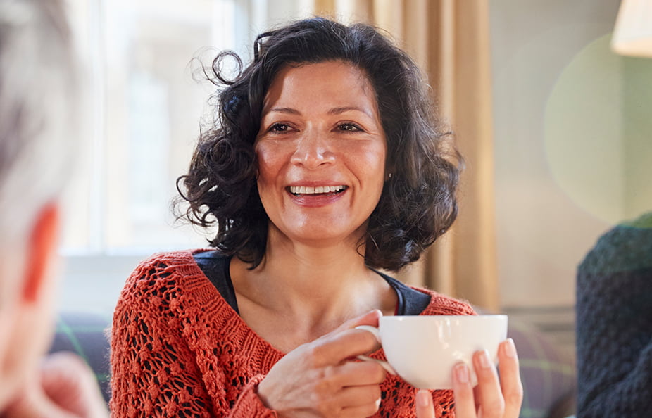 woman enjoying tea and a conversation